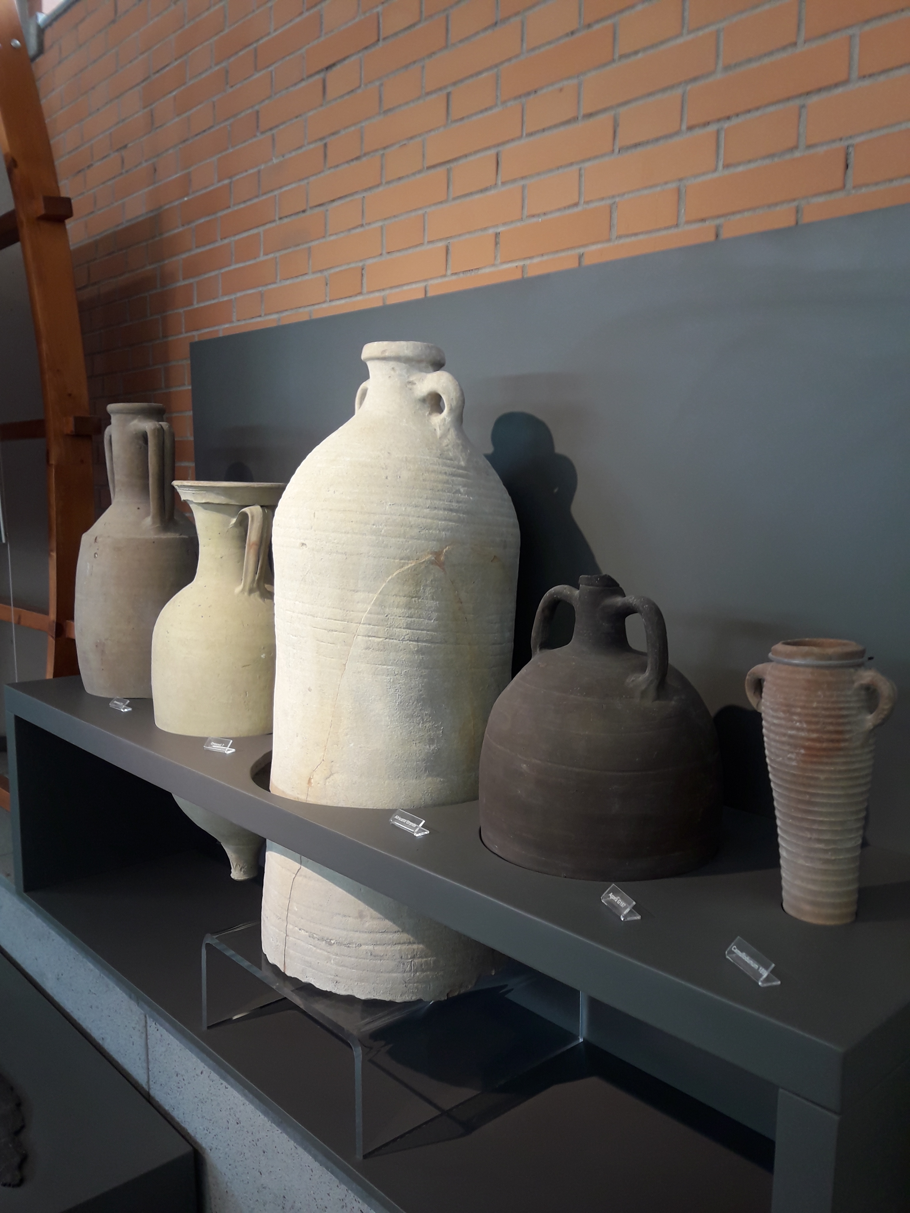 Amphoras displayed at the Boat Pavillon at ancient
        Herculaneum Photo © Maria Sannino